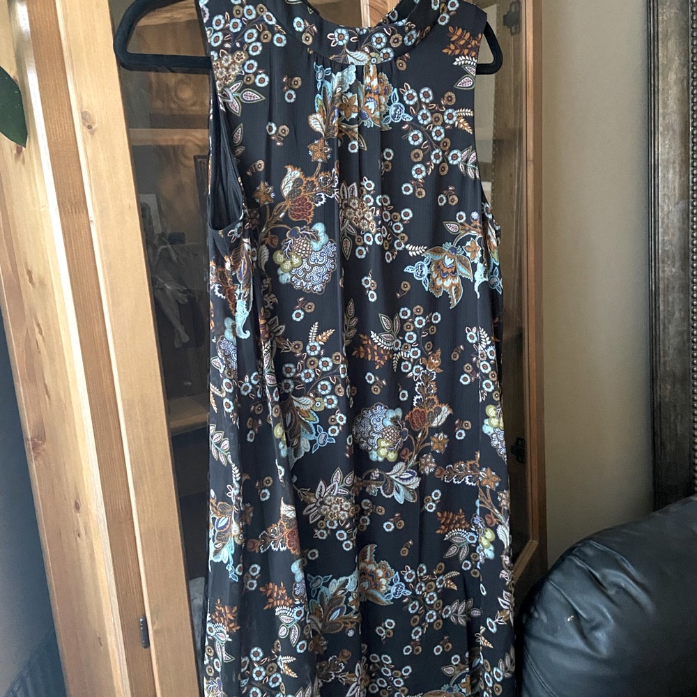 Floral mini a- line sleeveless dress. Beautiful under a blazer